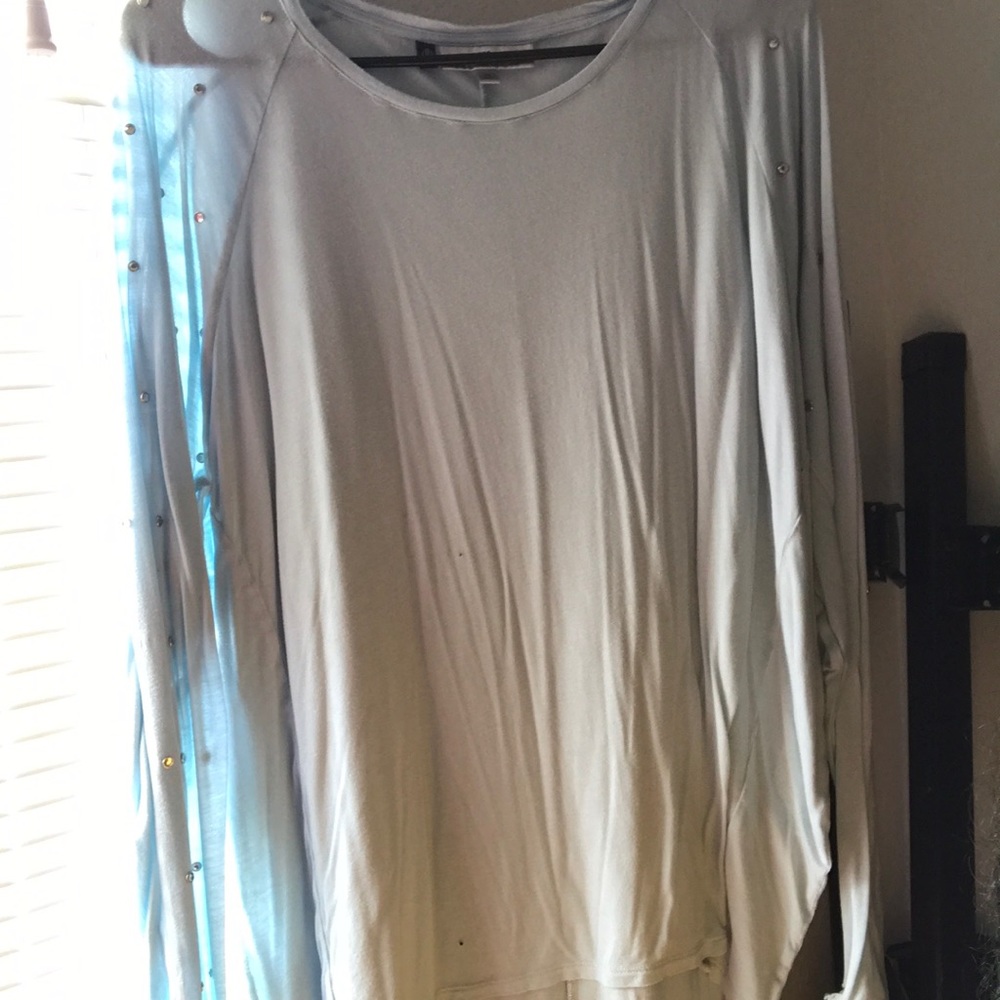 Light blue long sleeve , with diamonds on sleeves